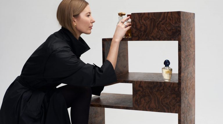 Walnut burl cabinet with fragrance on top